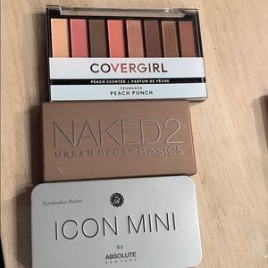 Three mini eyeshadow palettes